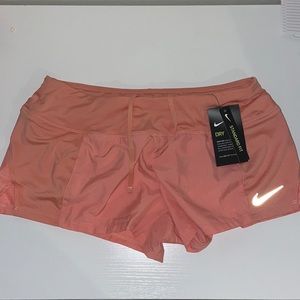 Peach/light pink running shorts